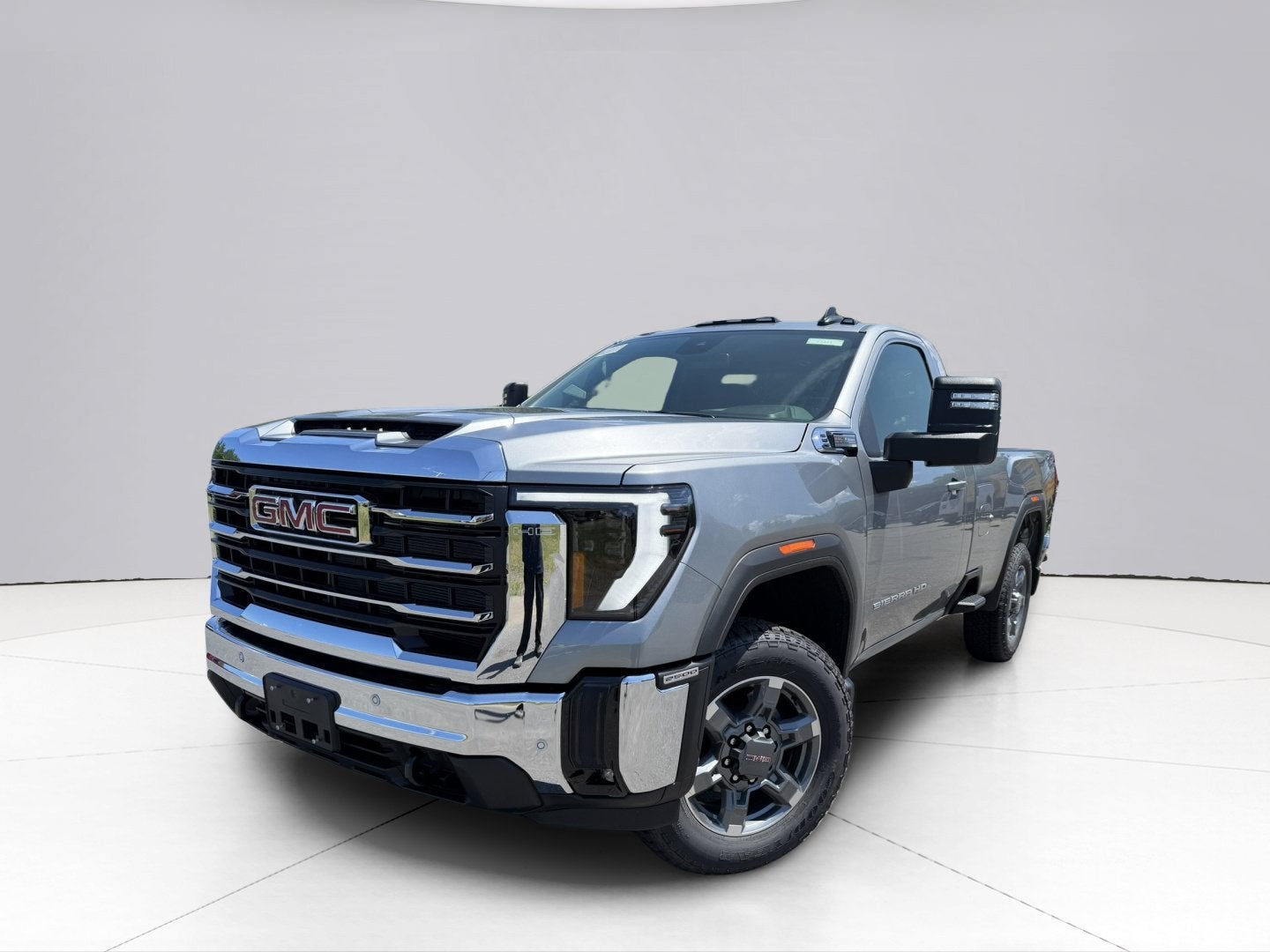 2026 GMC Sierra 2500 HD SLE in Sterling Metallic — front three-quarter view