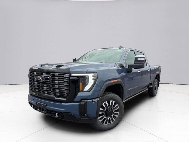 2026 GMC Sierra 3500 HD Denali Ultimate in Downpour Metallic — front three-quarter view