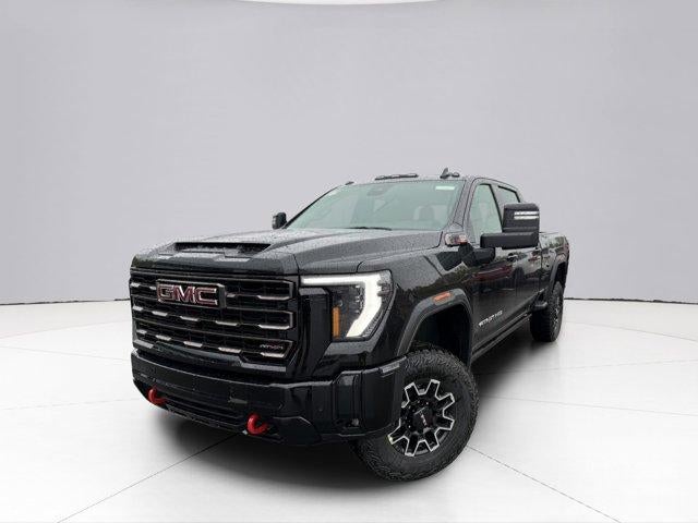 2026 GMC Sierra 2500 HD AT4X in Onyx Black — front three-quarter view