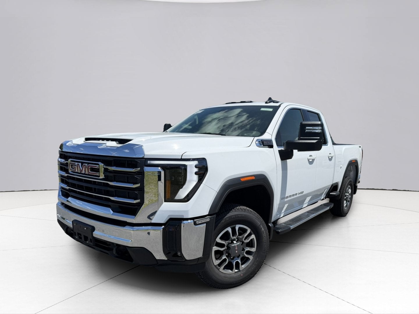 2026 GMC Sierra 2500 HD SLE in Summit White — front three-quarter view