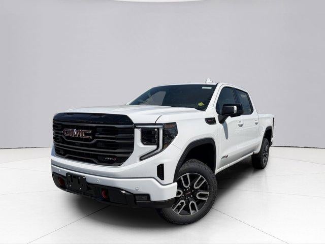 2026 GMC Sierra 1500 AT4 in Summit White — front three-quarter view